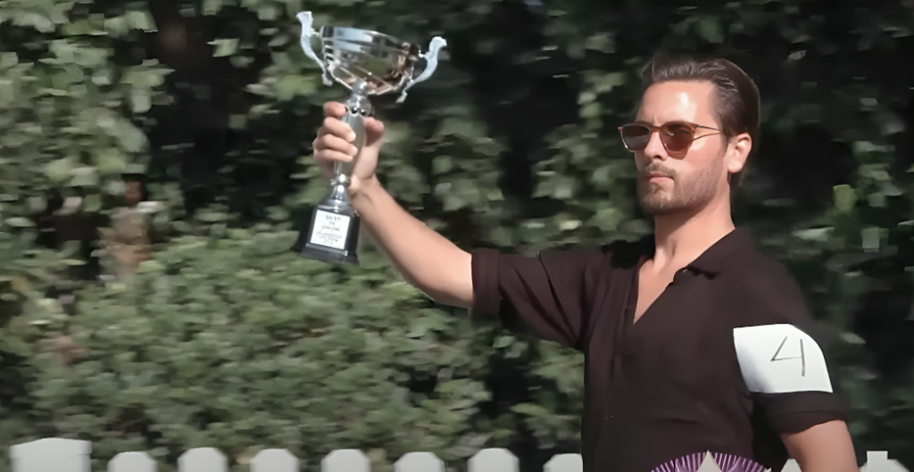 Scott Disick wears sunglasses holding trophy on Keeping Up With The Kardashians