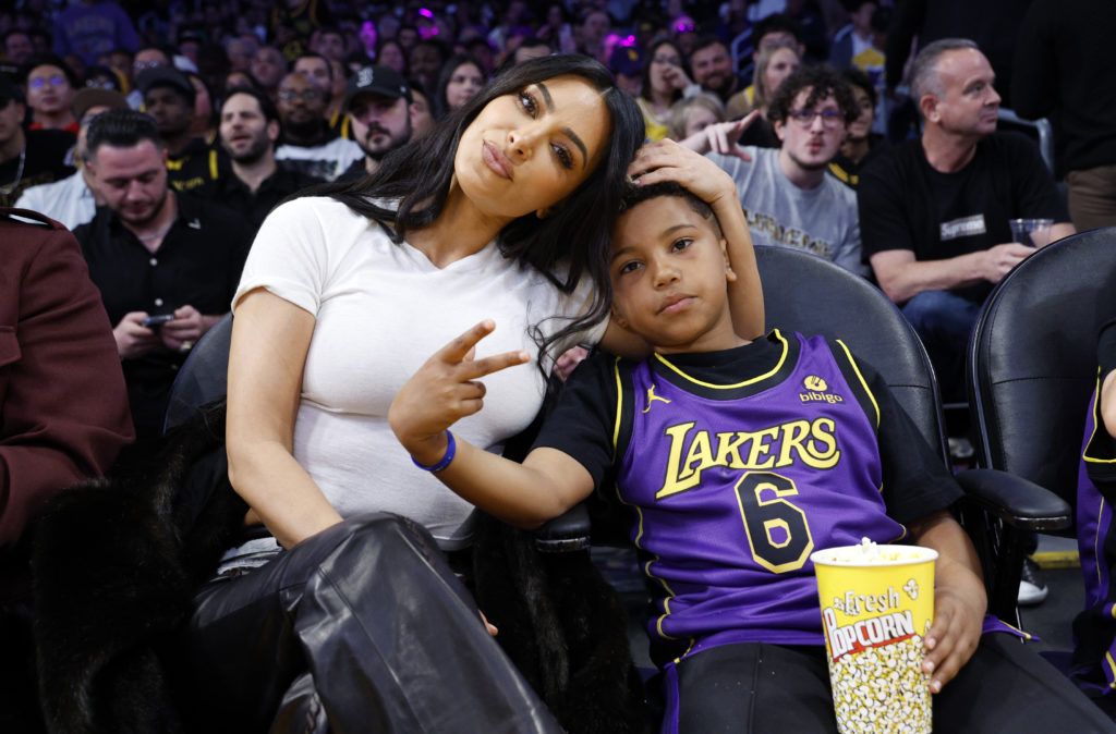 Kim Kardashian and Saint West attend a basketball game between the Los Angeles Lakers and Golden State Warriors at Crypto.com Arena on March 16, 20...