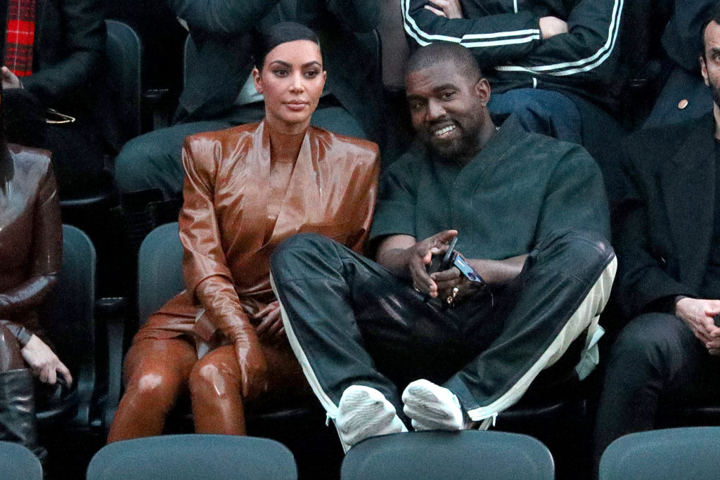 (EDITORIAL USE ONLY) Kim Kardashian and Kanye West attend the Balenciaga show as part of the Paris Fashion Week Womenswear Fall/Winter 2020/2021 on...