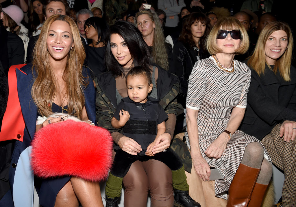 (L-R) Beyonce, Kim Kardashian with daughter North and Anna Wintour attend the adidas Originals x Kanye West YEEZY SEASON 1 fashion show during New ...