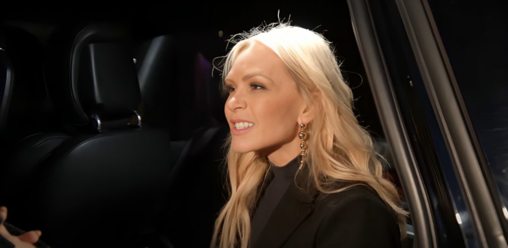 Tamra Judge speaks to RHOC co-star who is out of shot as she gets into car