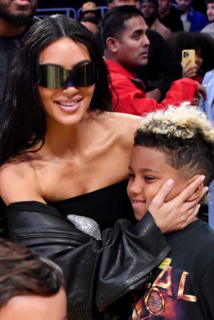 Kim Kardashian and Saint West attend a basketball game between the Los Angeles Lakers and the Phoenix Suns at Crypto.com Arena on December 05, 2023...