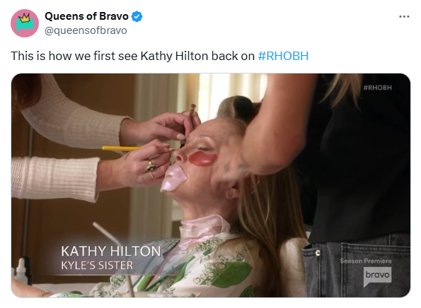 Kathy Hilton lies down with hair in rollers, eye and lip masks are on, eyes closed, and people doing make-up on RHOBH. IV drip seen in background.