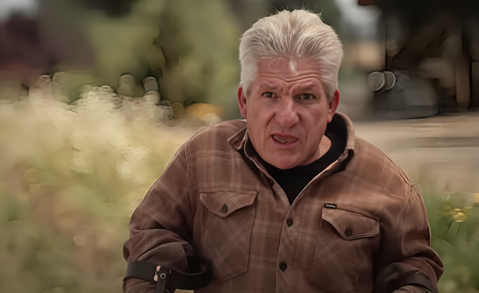 Matt Roloff wears jacket and has mouth open on Little People Big World.