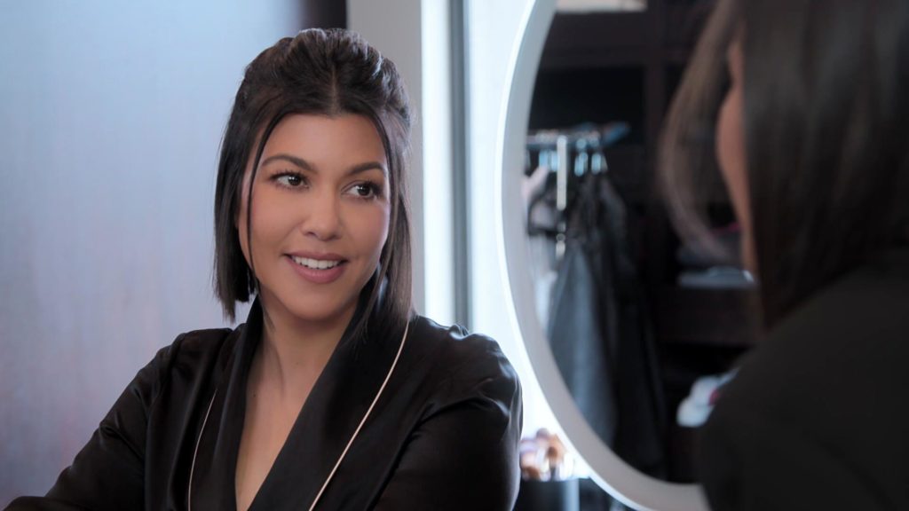 Kourtney Kardashian looks across shot on The Kardashians