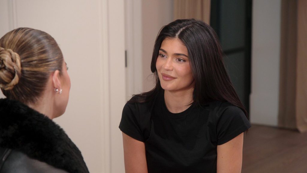 Kylie Jenner smiles at Khloe Kardashian on The Kardashians.