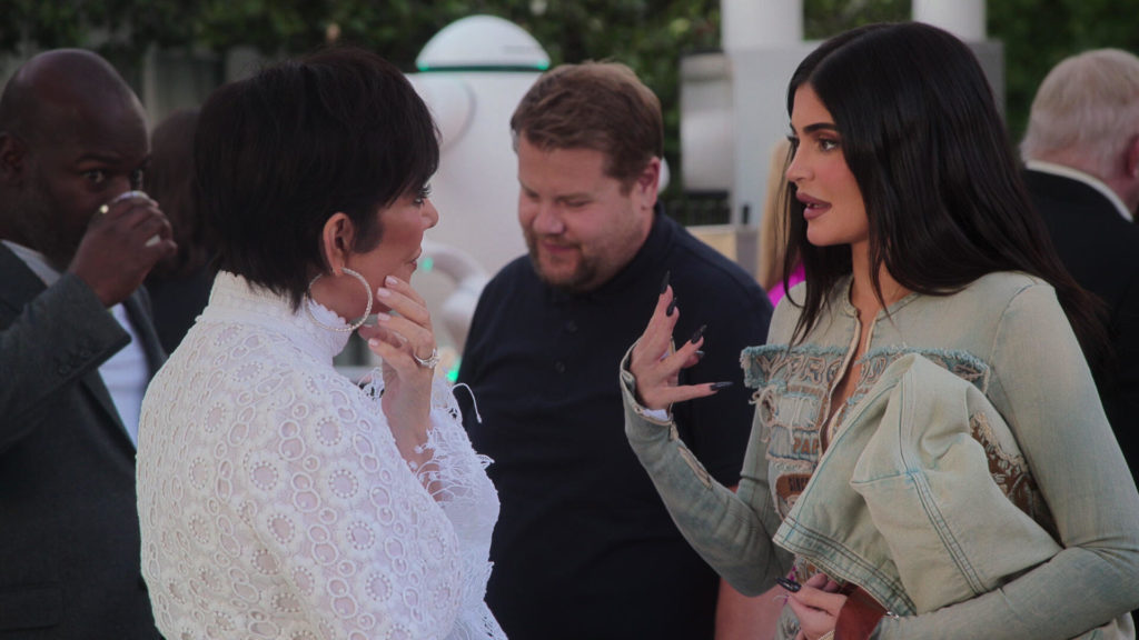 Kris Jenner and Kylie Jenner talk, James Corden in background, on The Kardashians.