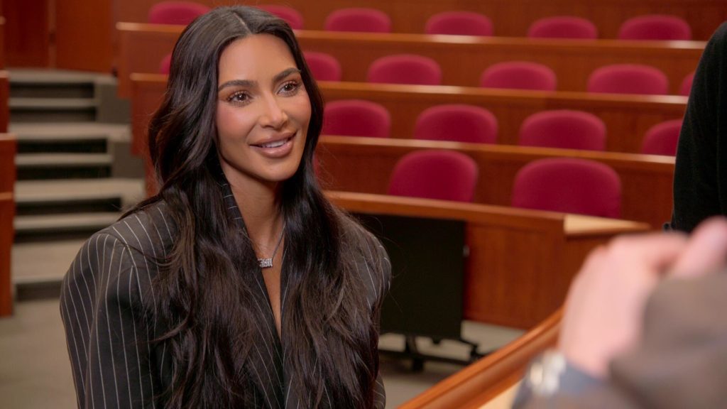 Kim Kardashian smiles during The Kardashians